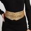 Elastic rubber waist seal with golden sequined rivets